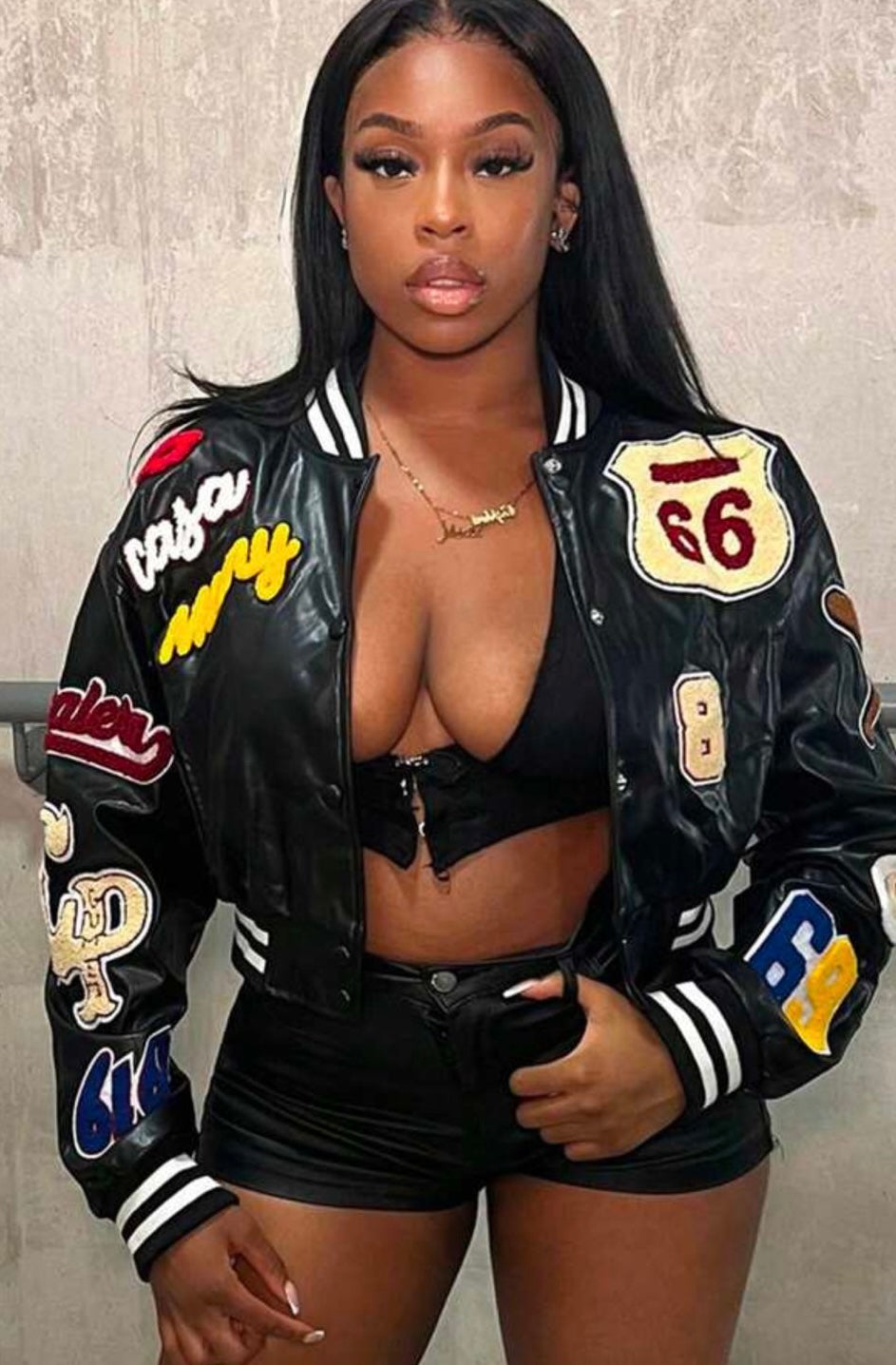Black crested varsity jacket